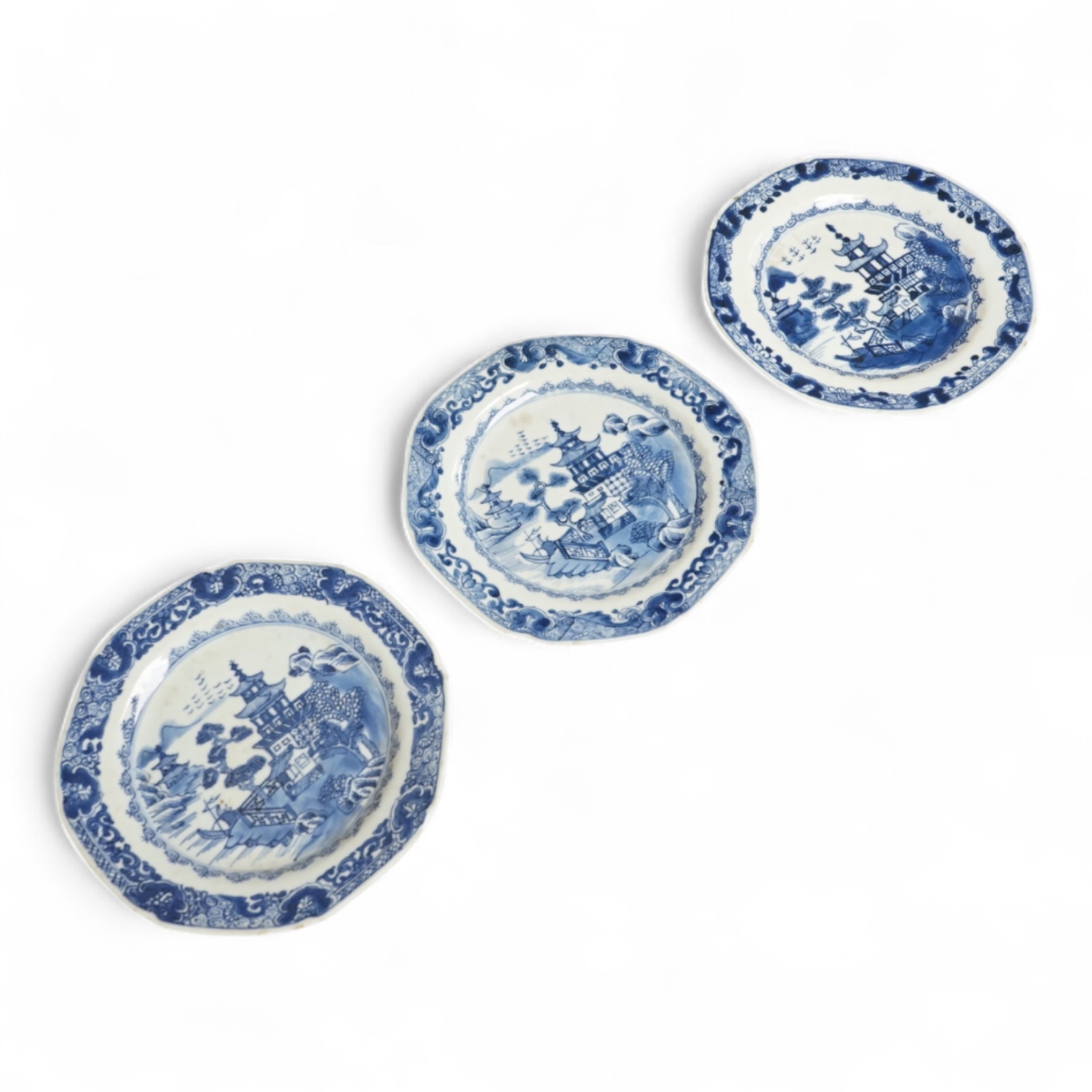 Three 18th century Chinese blue and white Export side plates, 19cm diameter
